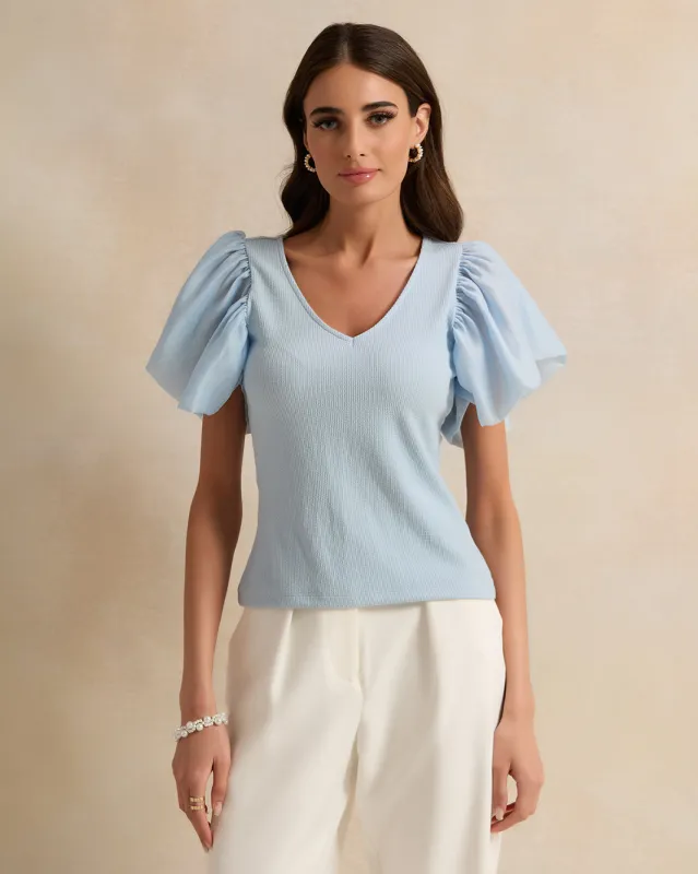 Women Blue Solid Puff Short Sleeve Top sold by Redtag