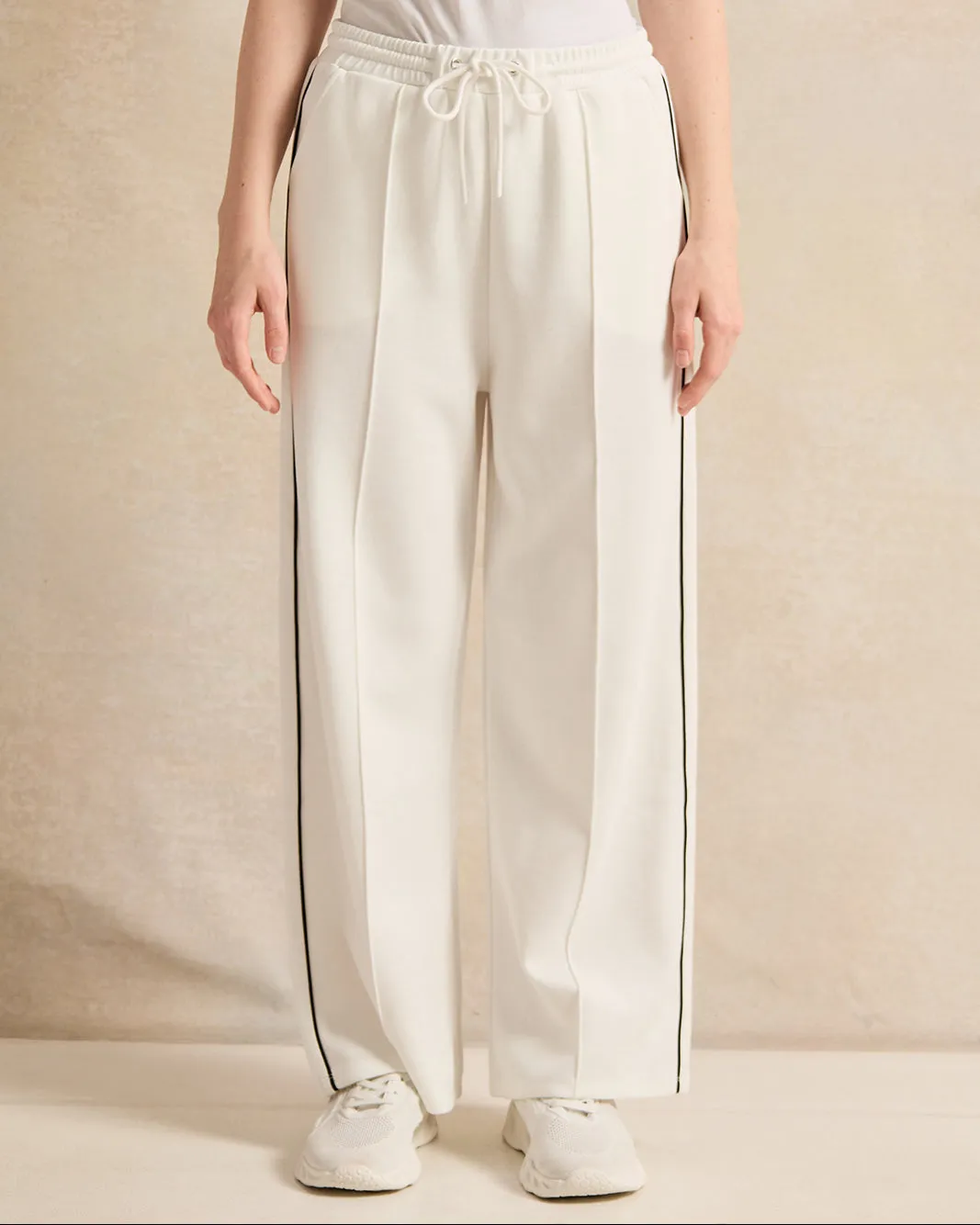 Senior Girls White Printed Track Pants sold by Redtag