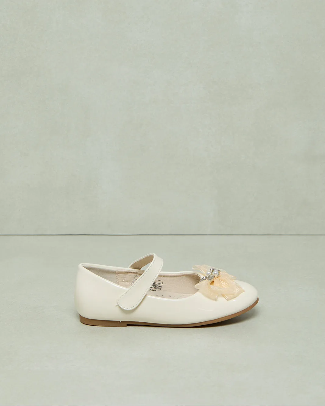 Girls Cream Pearl Bow Ballerina sold by Redtag