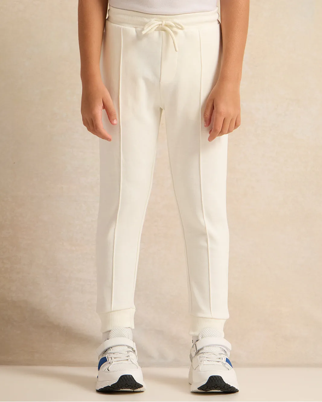 Boys Cream Plain Track Pants sold by Redtag