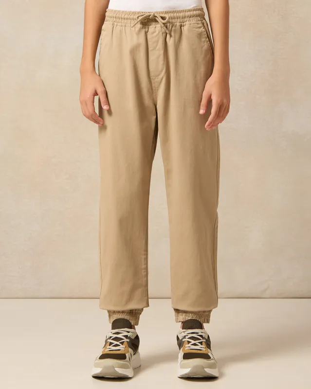 Senior Boys Beige Pull On Solid Jogger sold by Redtag
