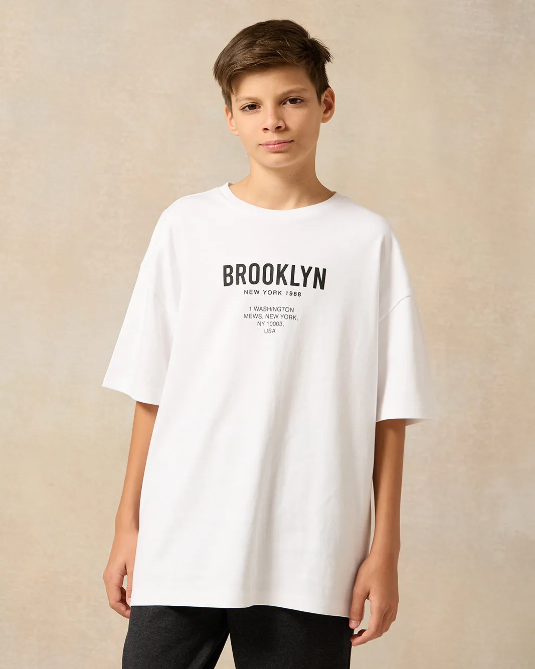 Senior Boys White Brooklyn New York 1988 Print Over Size T-Shirt sold by Redtag