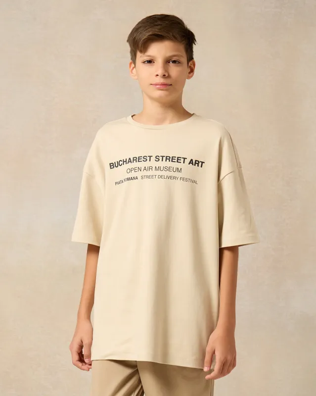 Senior Boys Beige Graffiti Street Print Over Size T-Shirt sold by Redtag