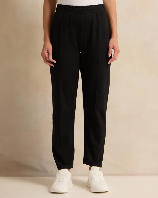 Women Black Solid Active Pants sold by Redtag