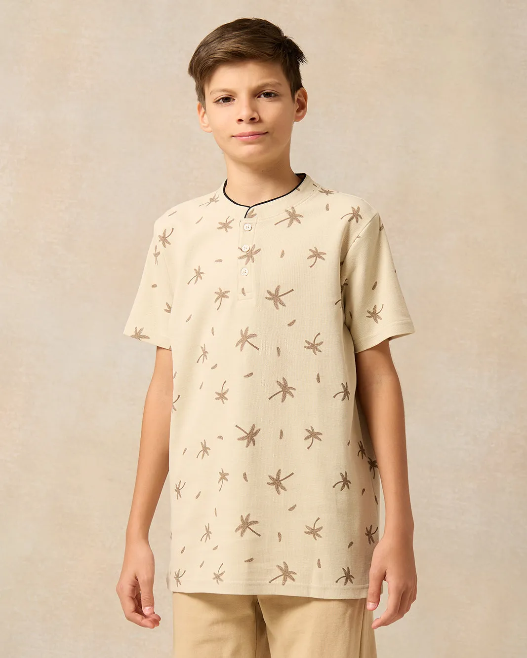 Senior Boys Beige Printed Polo Shirt sold by Redtag