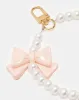 Women White Embellished Key Ring sold by Redtag
