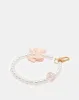 Women White Embellished Key Ring sold by Redtag