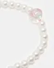 Women White Embellished Key Ring sold by Redtag