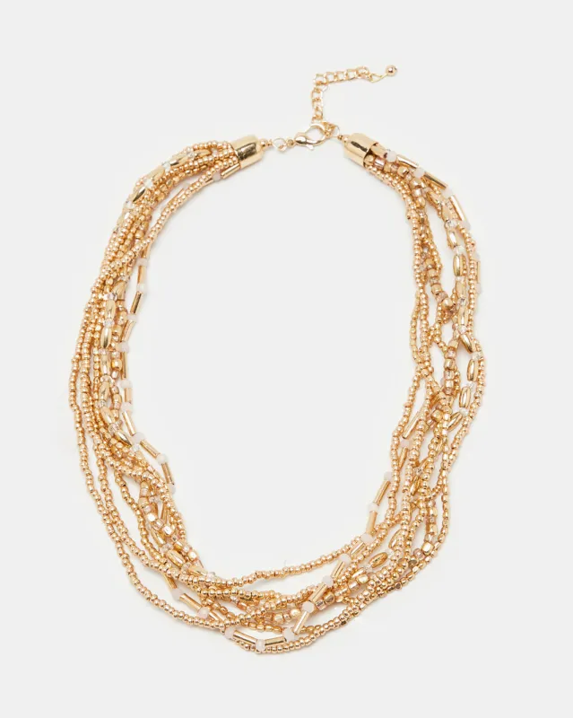 Women Gold Embellished Necklace sold by Redtag