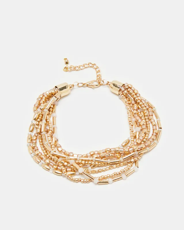 Women Gold Embellished Bracelet sold by Redtag