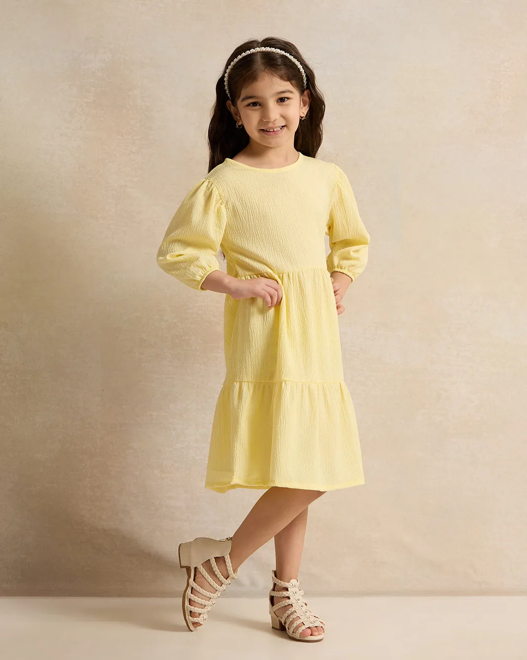 Girls Yellow Textured Dress sold by Redtag