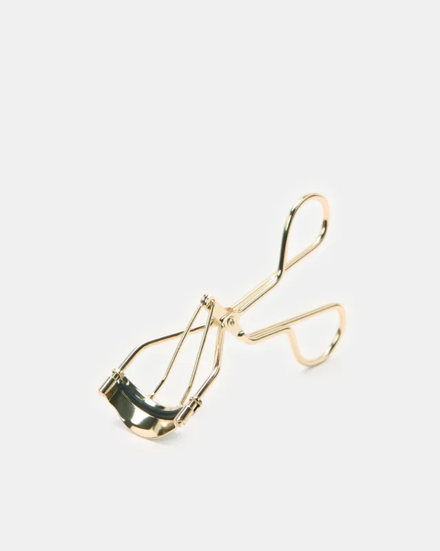 Women Gold Eyelash Curler sold by Redtag