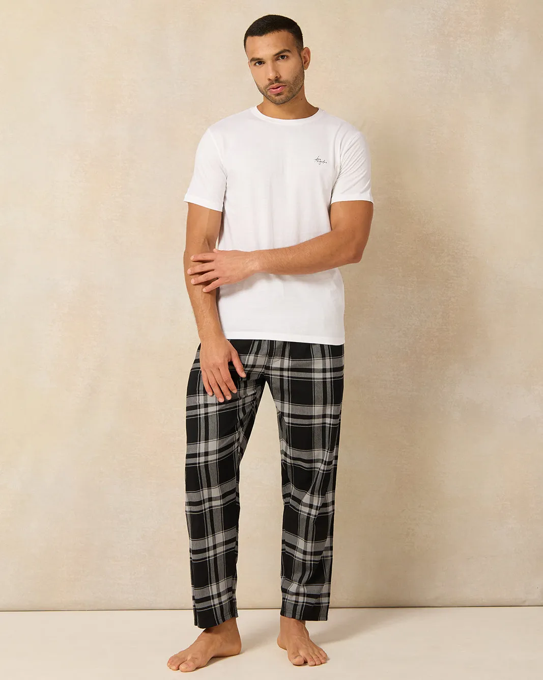 Men White And Black Checkered Pyjama Set (2 Piece) sold by Redtag