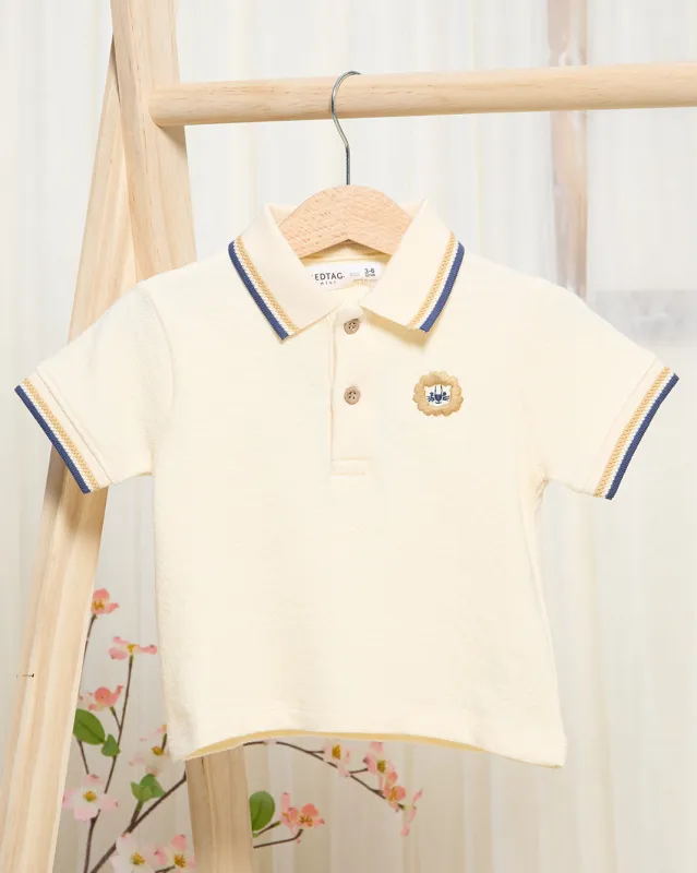 Infant Boys Cream Waffle Polo With Chest Print sold by Redtag