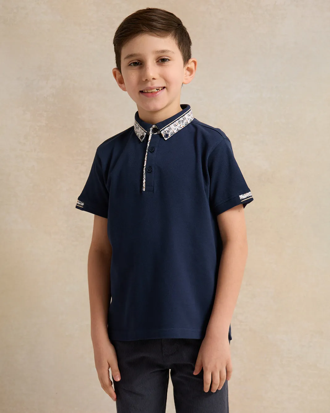Boys Navy Printed Polo Shirt sold by Redtag