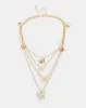 Women Gold Embellished Necklace sold by Redtag