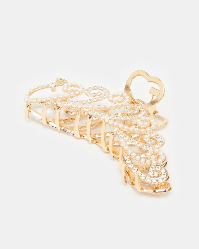 Women Gold Embellished Hair Clip sold by Redtag