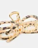 Women Gold Embellished Hair Clip sold by Redtag