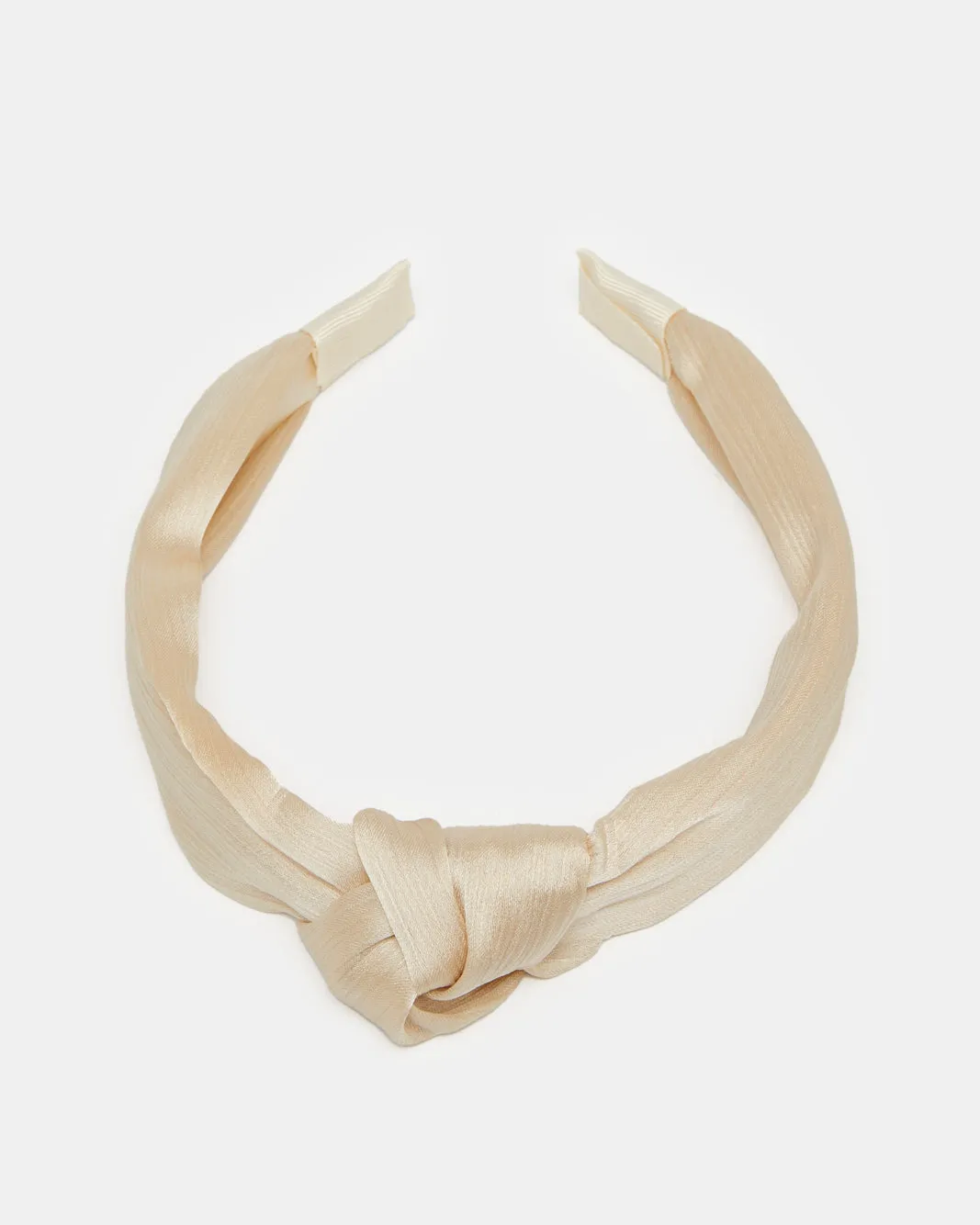 Women Beige Solid Headband sold by Redtag