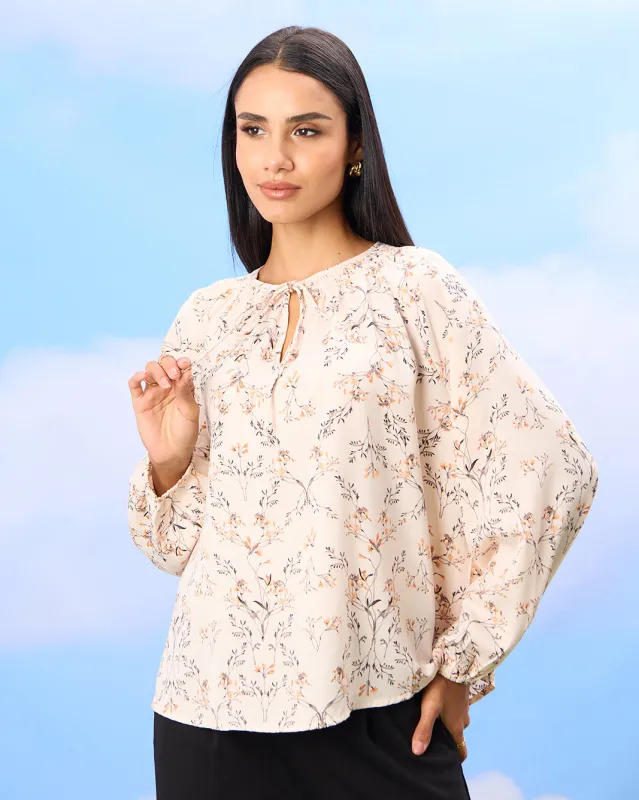 Women Ivory Printed Volume Sleeve Tie Detailed Blouse sold by Redtag