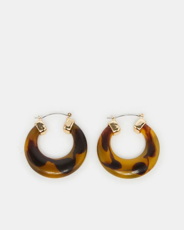 Women Brown And Gold Embellished Earring sold by Redtag