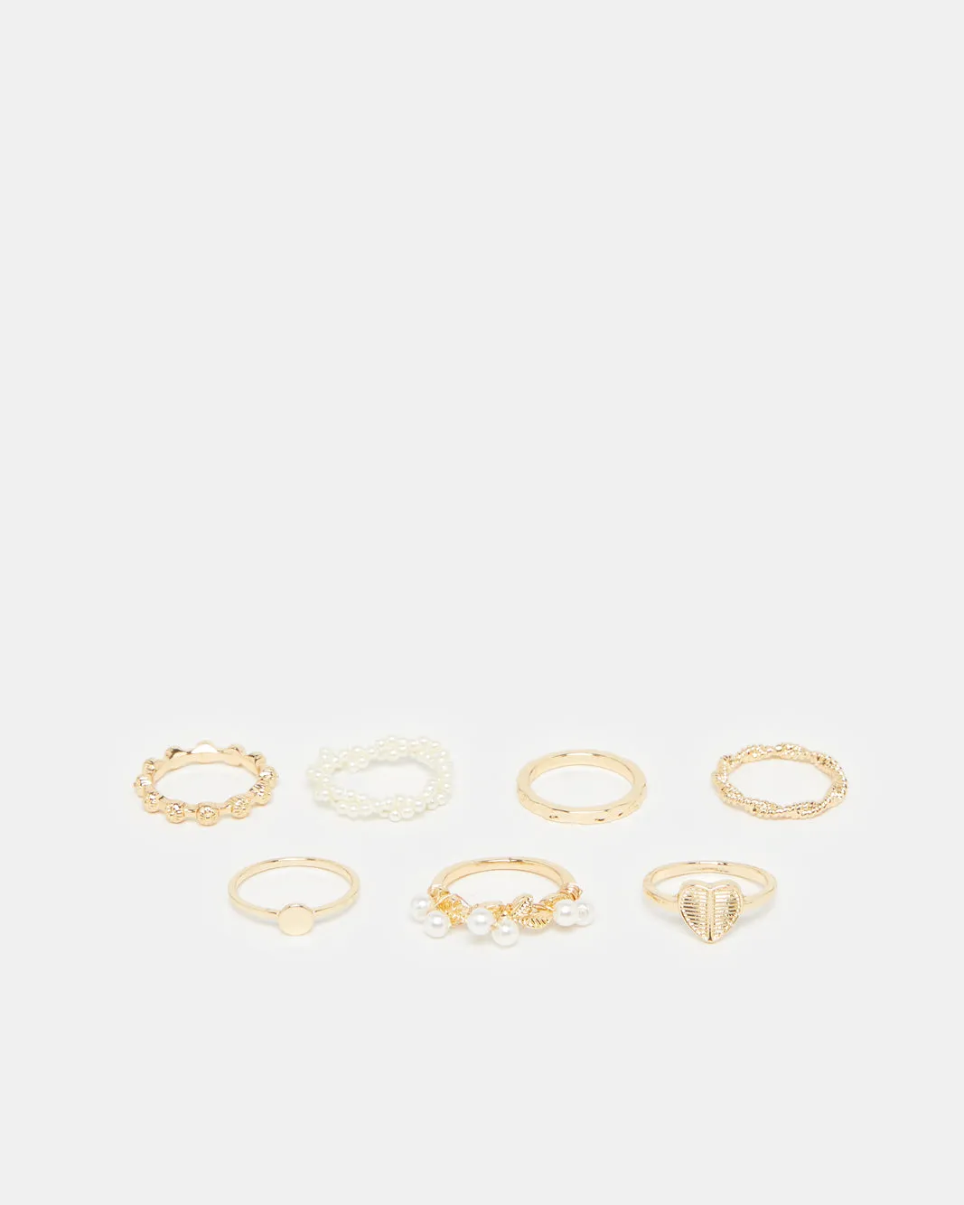 Women Gold Embellished Ring Set (Pack of 7) sold by Redtag
