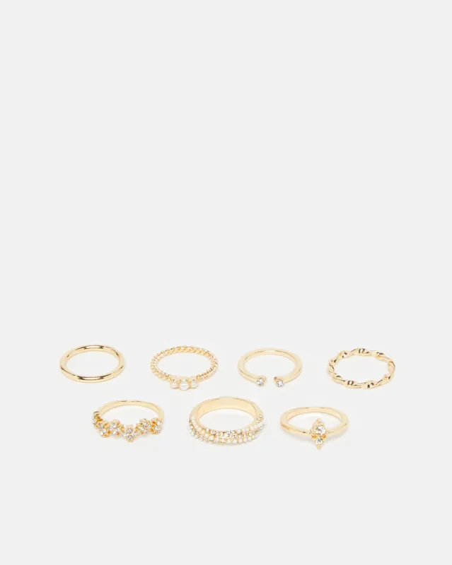Women Gold Embellished Ring Set (Pack of 7) sold by Redtag