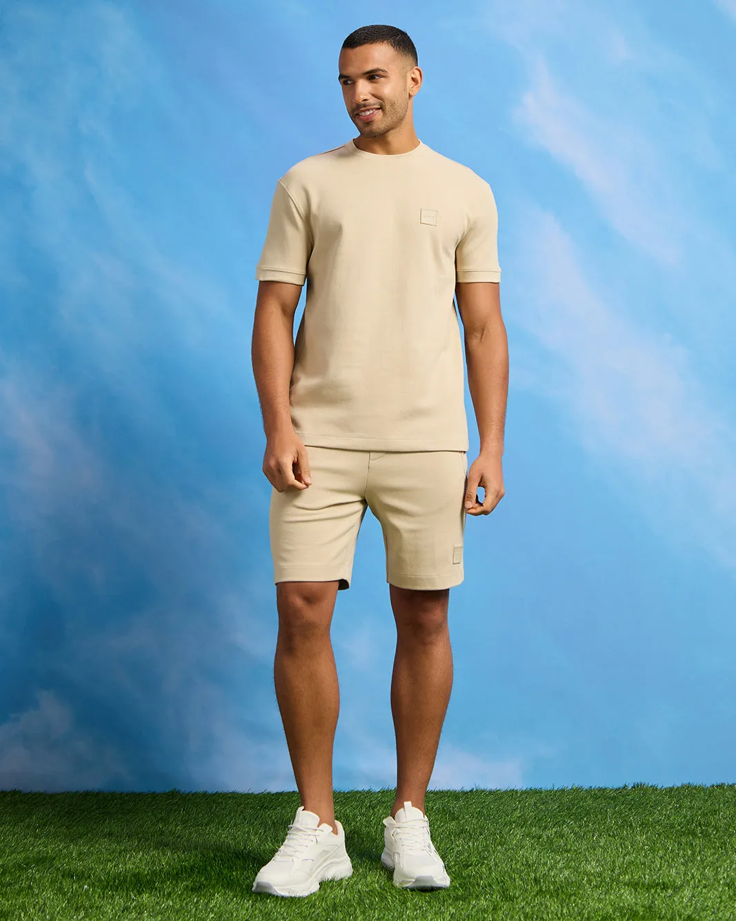 Men Beige Solid Lounge Short sold by Redtag