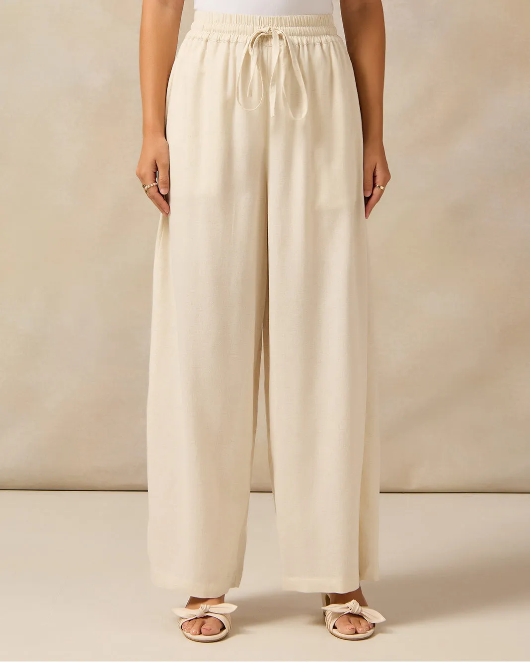 Women Ivory Wide Leg Trousers sold by Redtag