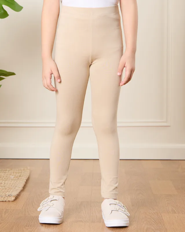 Girls Beige Solid Leggings sold by Redtag