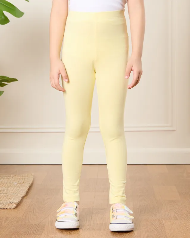 Girls Yellow Solid Leggings sold by Redtag