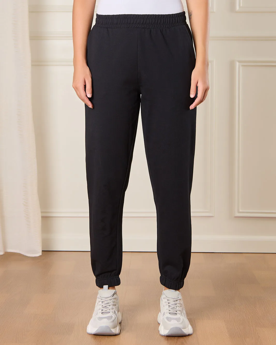 Women Black Solid Active Pants sold by Redtag