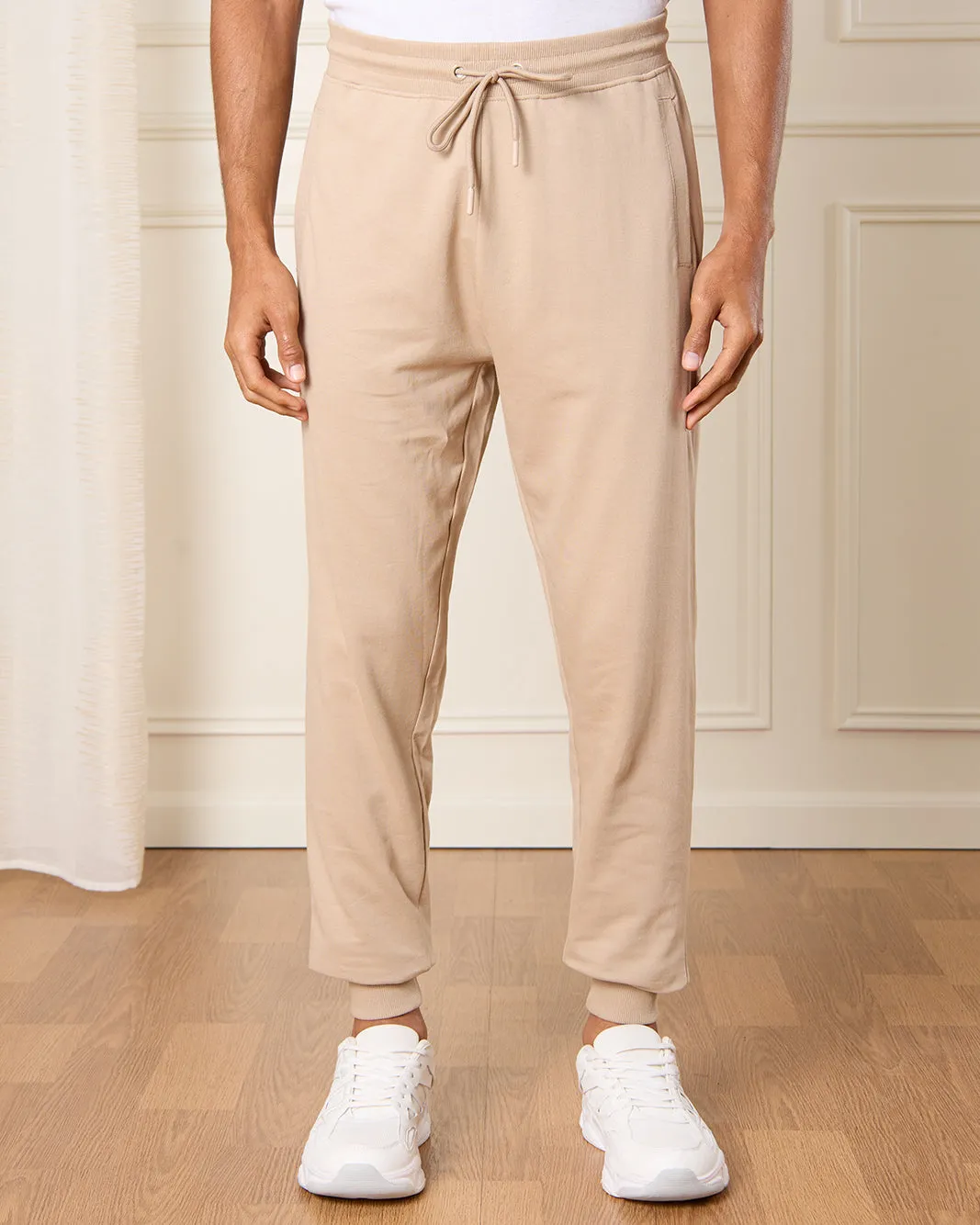 Men Beige Plain Active Pants sold by Redtag