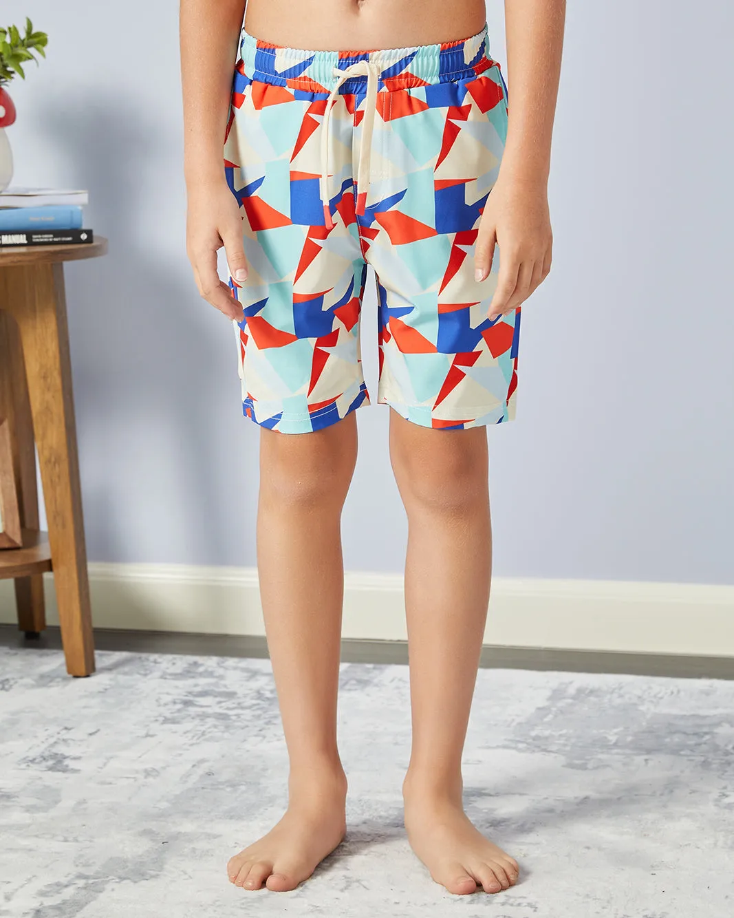 Boys Blue Geometric Print Swim Shorts sold by Redtag
