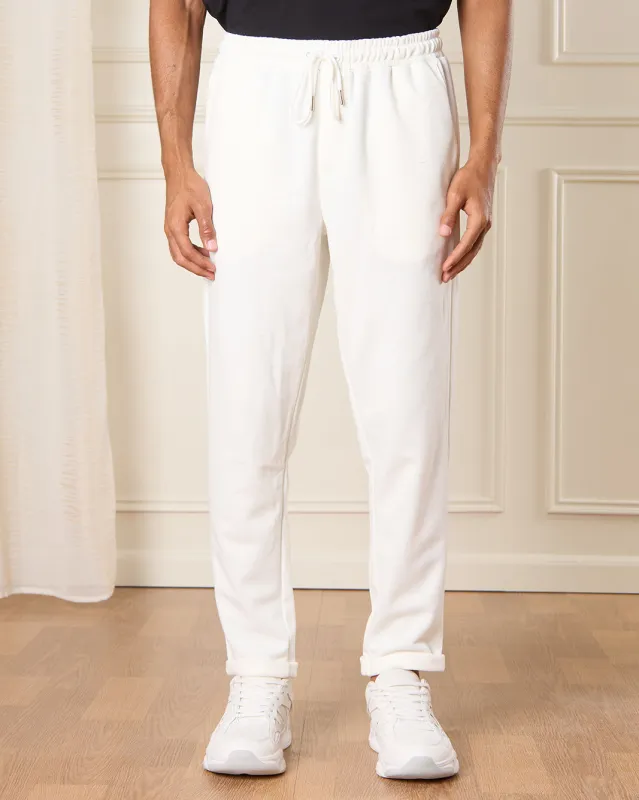 Men White Solid Active Pants sold by Redtag