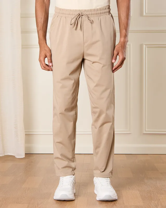 Men Beige Solid Active Pants sold by Redtag