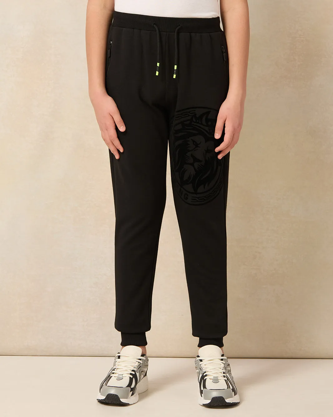 Senior Boys Black Lion Flock Print Active Pants sold by Redtag