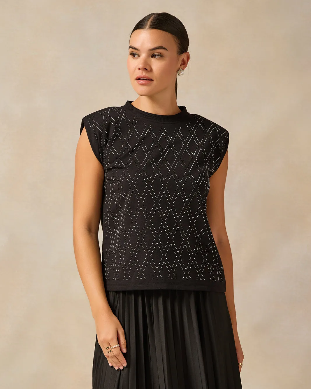 Women Black Diamond Rhine Stone Heat Set Shoulder Padded Top sold by Redtag