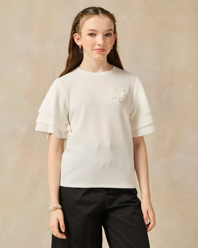 Senior Girls White Ruffled Sleeve Embellished With Flower Top sold by Redtag