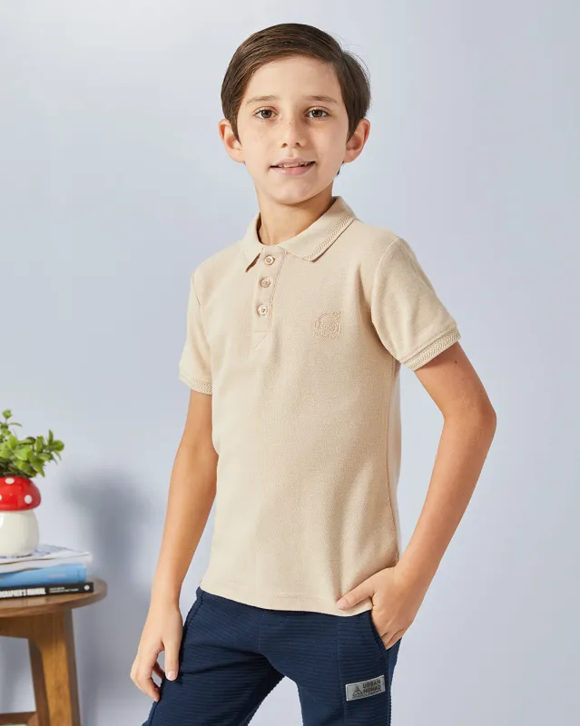 Boys Beige Solid Polo Shirt sold by Redtag