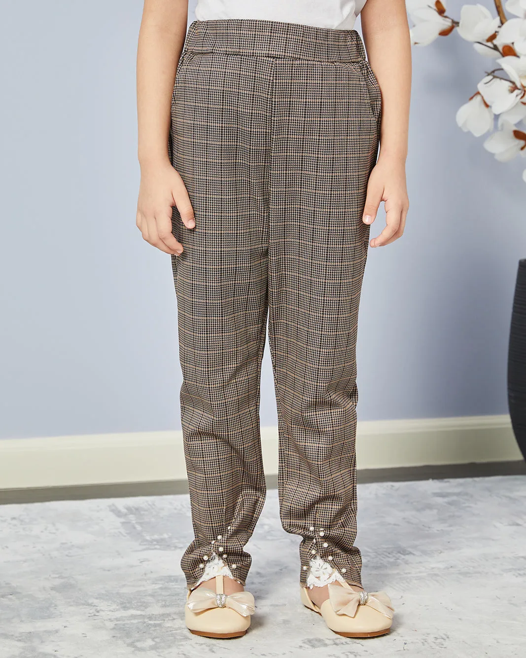 Girls Brown Checkered Pants sold by Redtag