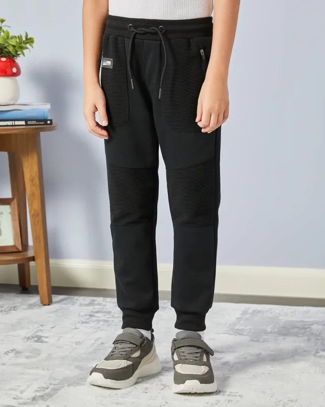 Boys Black Ribbed Track Pants sold by Redtag