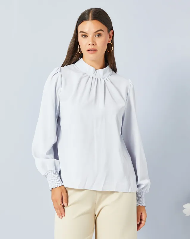 Women Blue Solid Casual Top sold by Redtag