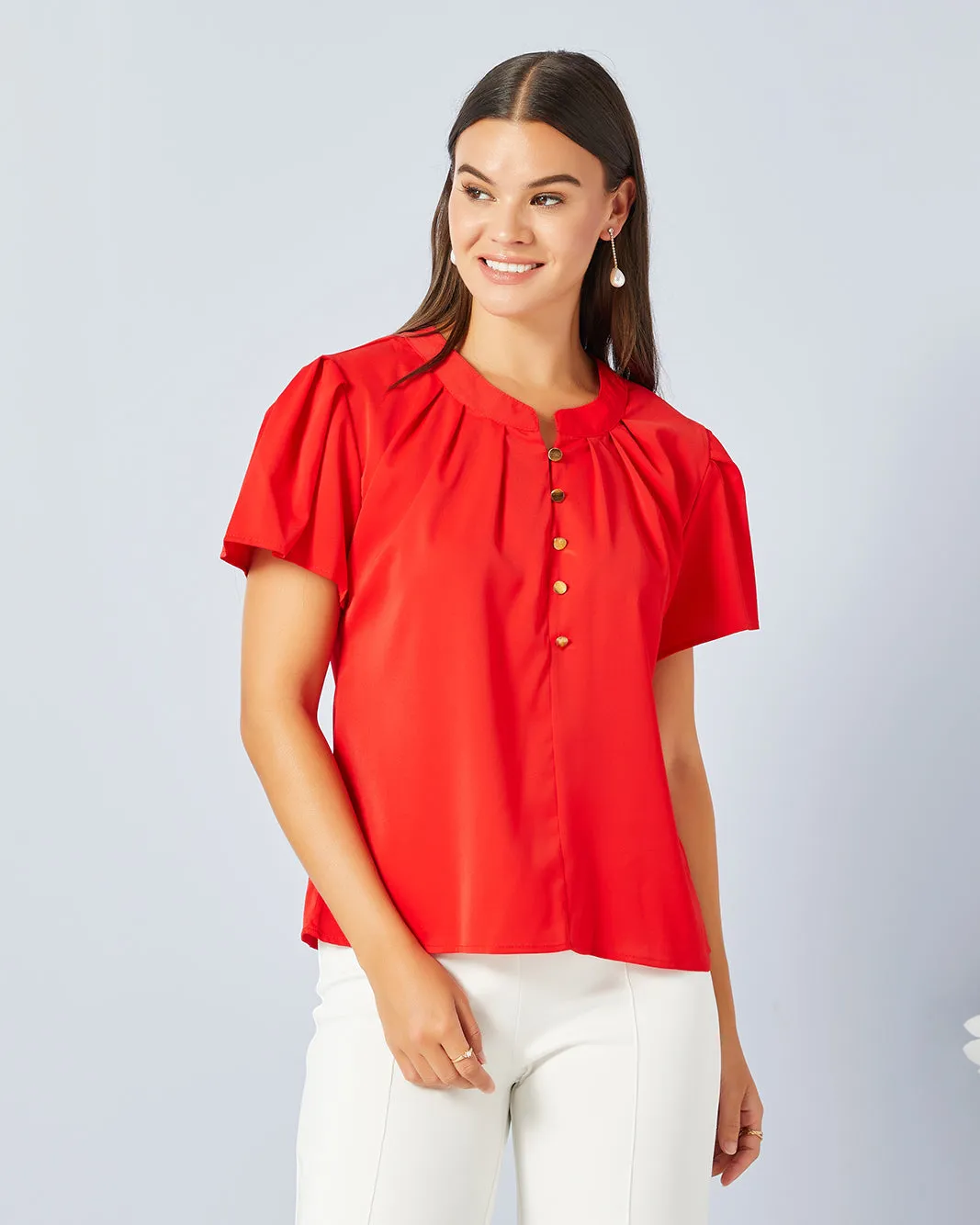 Women Red Solid Casual Blouse sold by Redtag