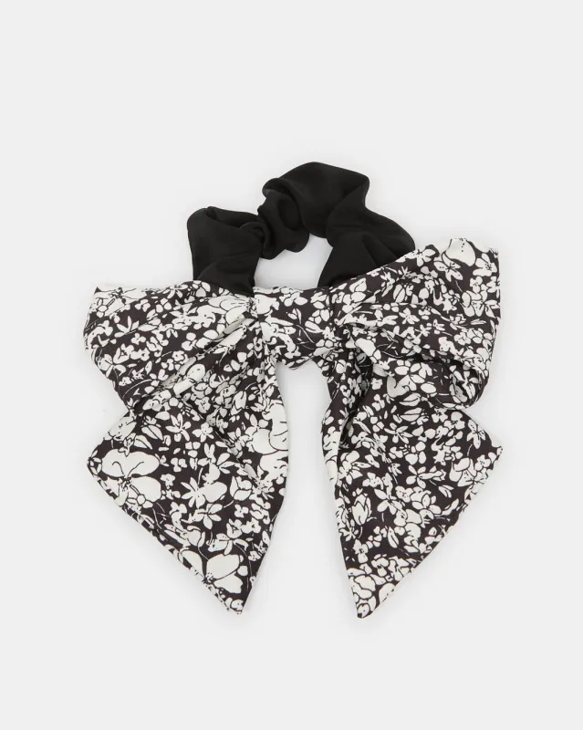 Women Black Printed Scrunchy sold by Redtag