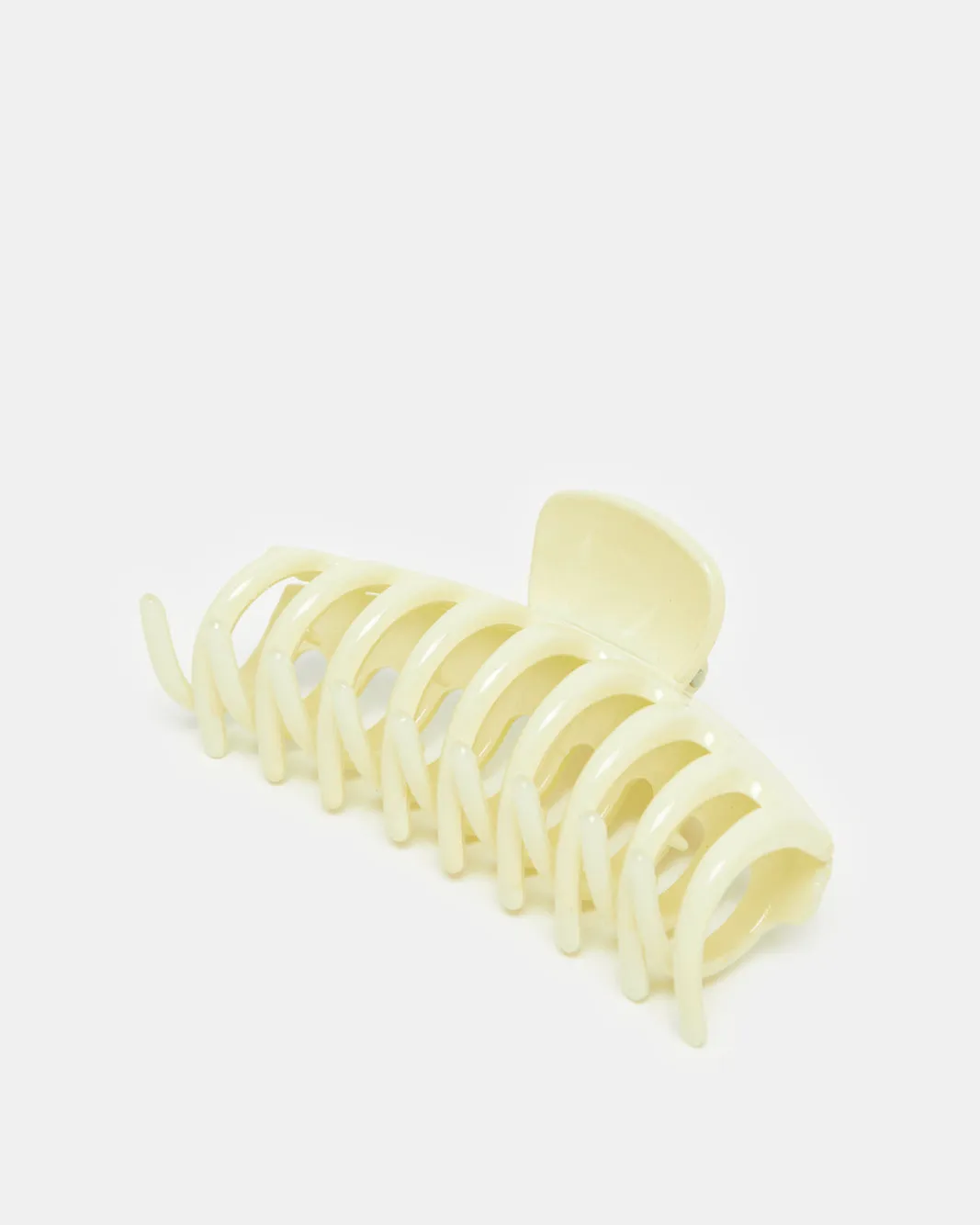Women Ivory Solid Hair Claw sold by Redtag