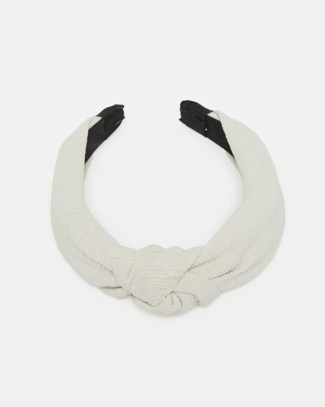 Women Ivory Solid Headband sold by Redtag