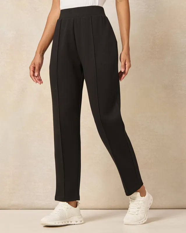 Women Black Solid Active Pants sold by Redtag