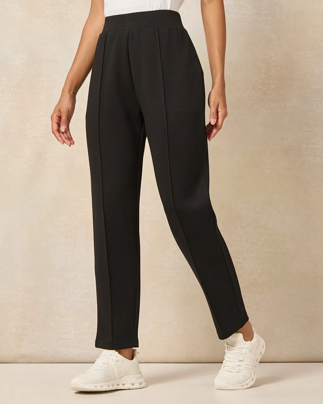 Women Black Solid Active Pants sold by Redtag