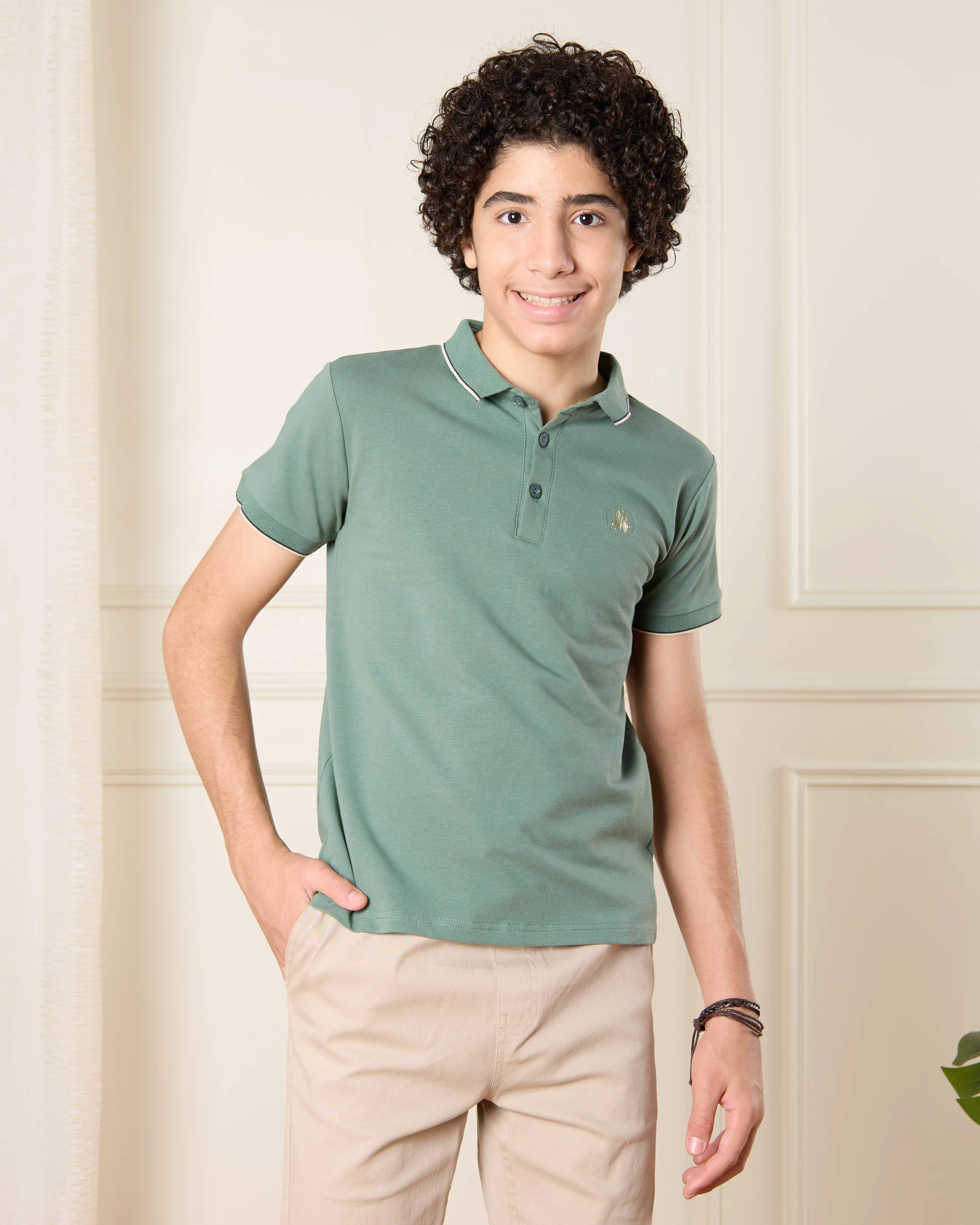 Senior Boys Green Polo T-Shirt sold by Redtag